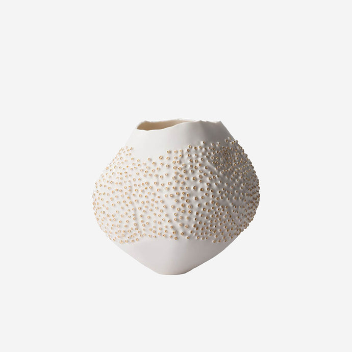 Inspired by the shapes and textures of Zoanthid corals, this vase is a beautiful expression of meticulous craftsmanship. A minute raised pattern and 24 karat gold accents create a unique surface, making each Porifera vase a one-of-a-kind piece